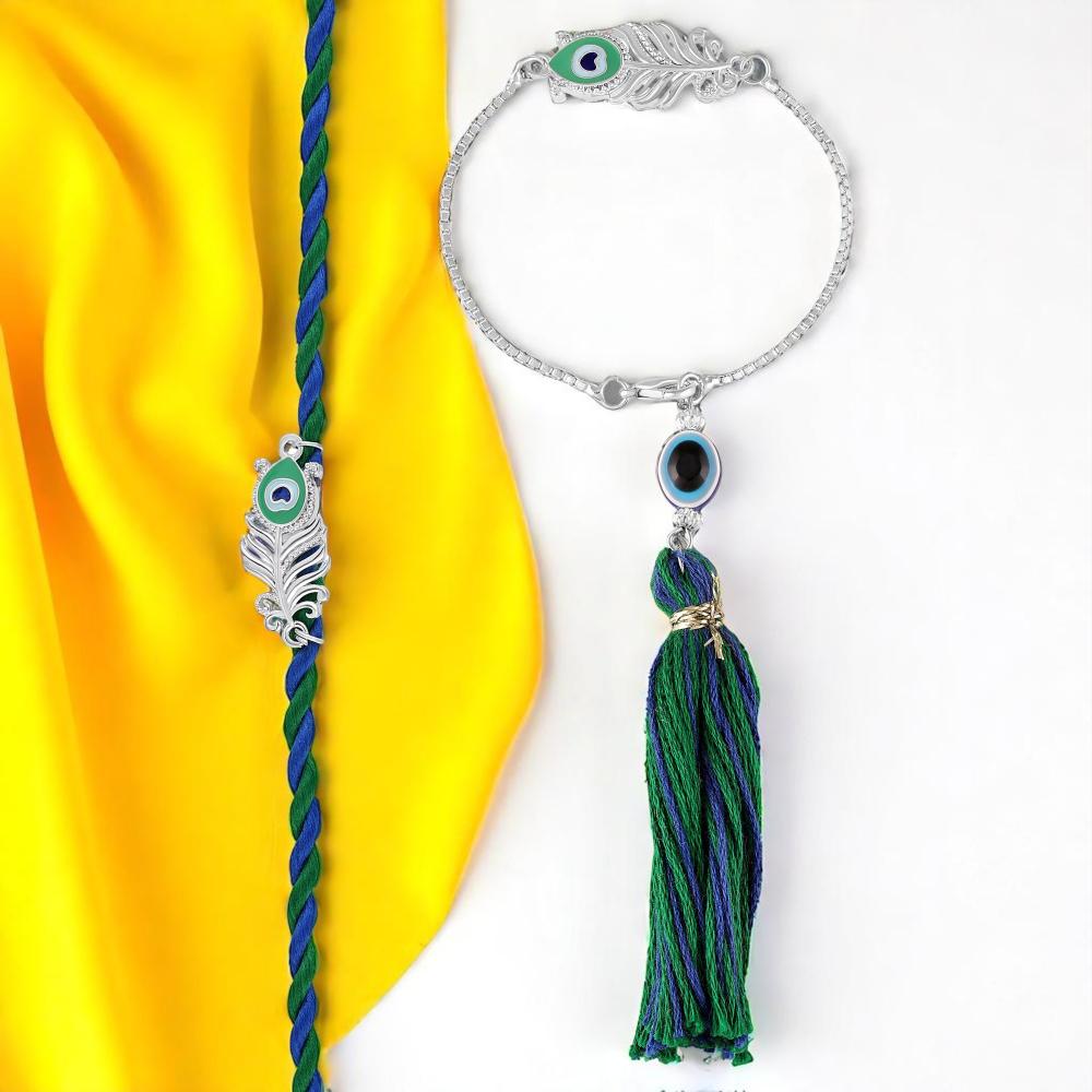 Mahi Couple Rakhi Set of Peacock-Feather-Themed Bhaiya Bhabhi Rakhi with Evil Eye & Silk Tassel Bracelet (RCOL1105851R)