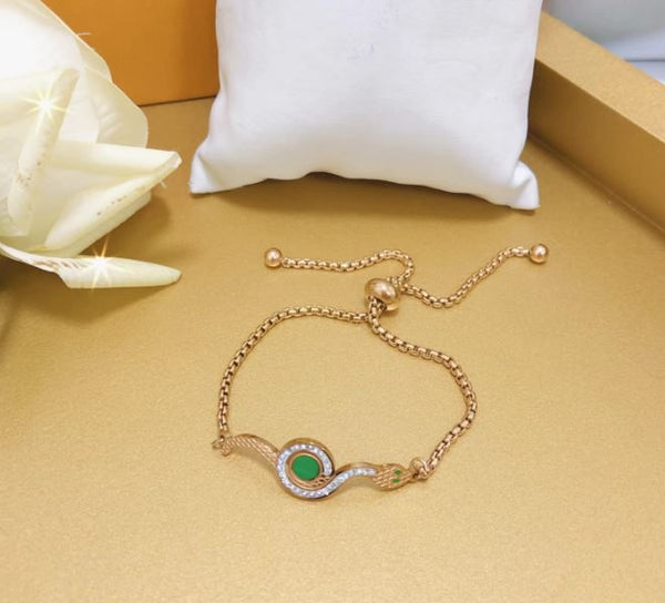 Tarohi Jewels Stainlees Steel Green Eye Snake Bracelet