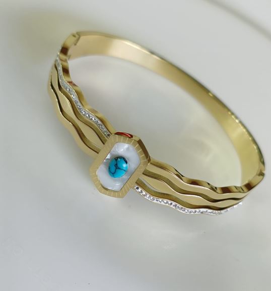 Tarohi Jewels Stainless Steel Gold Plated Turquoise Geometric Shaped Evil Eye Kada- STKD 4837