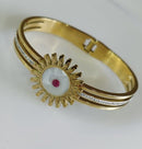 Tarohi Jewels Stainless Steel Gold Plated Floral Shaped Evil Eye Kada- STKD 4843