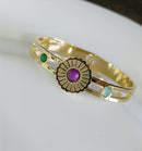 Tarohi Jewels Stainless Steel Gold Plated Floral Shaped Pink Coloured Gemstone Kada - STKD 4866