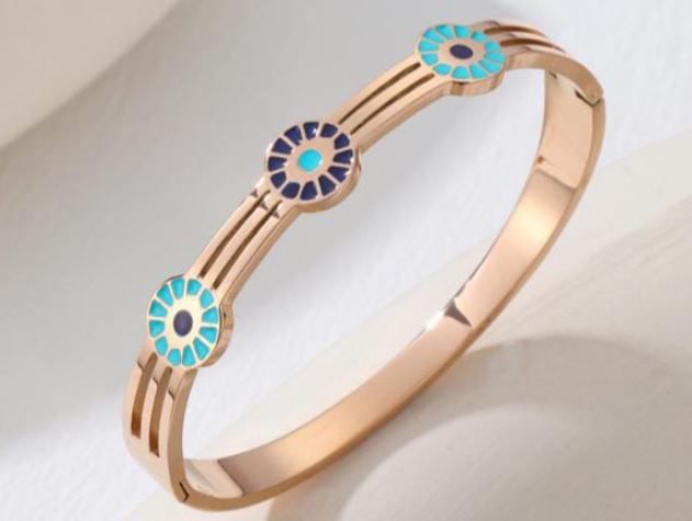 Tarohi Jewels Stainless Steel Gold/Rosegold Plated Evil Eye Kada - STKD 4881