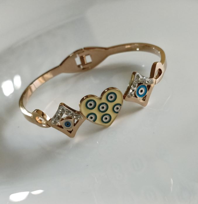 Tarohi Jewels Stainless Steel Gold/Rosegold Plated Heart Shaped Evil Eye Kada- STKD 4885