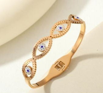 Tarohi Jewels Stainless Steel Gold/Rosegold Plated Evil Eye Kada- STKD 4893