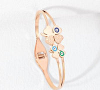 Tarohi Jewels Stainless Steel Gold/Rosegold Plated Flower Design Evil Eye Kada- STKD 4917