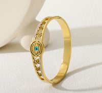 Tarohi Jewels Stainless Steel Gold Plated Om Design Evil Eye Kada- STKD 4919