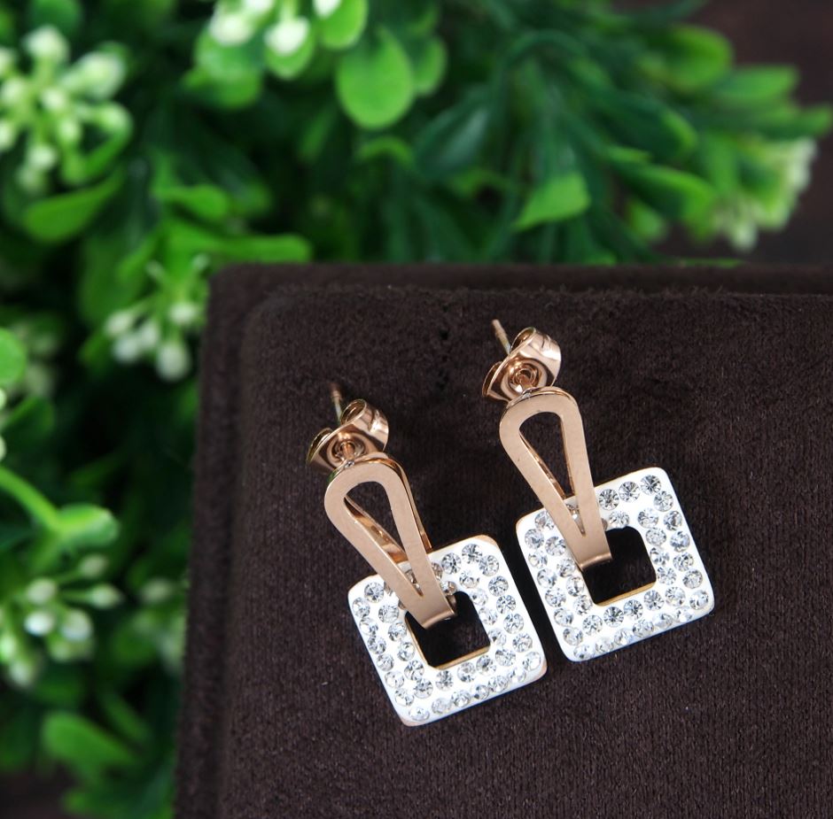 Tarohi Jewels Stainless Steel Rosegold Plated Square Shaped White Coloured Earring-STNER 2767