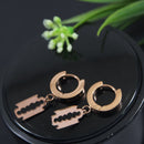 Tarohi Jewels Stainless Steel Rosegold Plated Razor Blade Shaped Hoops Earring- STNER 4060