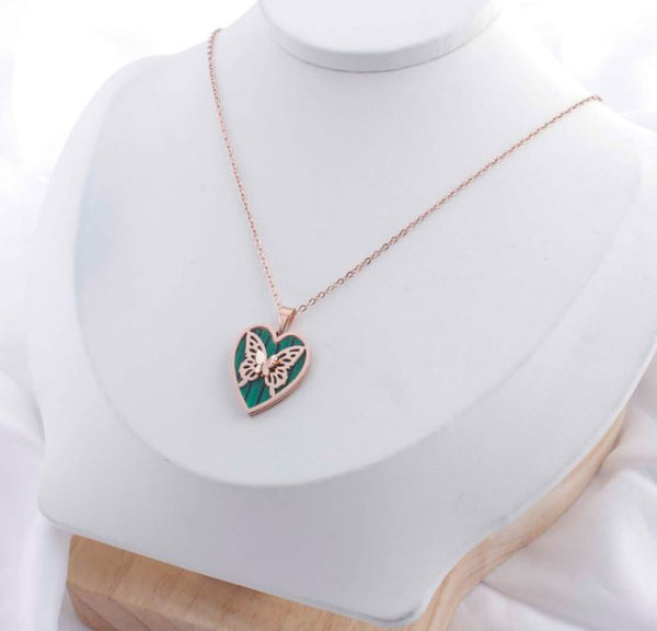 Tarohi JewelsStainless Steel Heart Inside Butterfly Pendent Necklace - STNK 5019