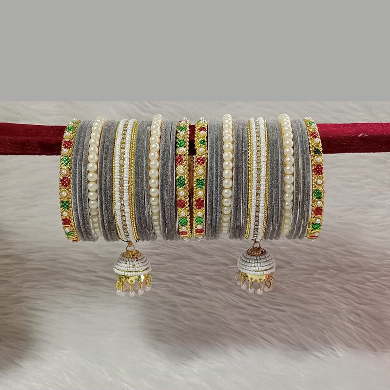 Pooja Bangles Gold Plated Austrian Stone And Velvet Bangles Set