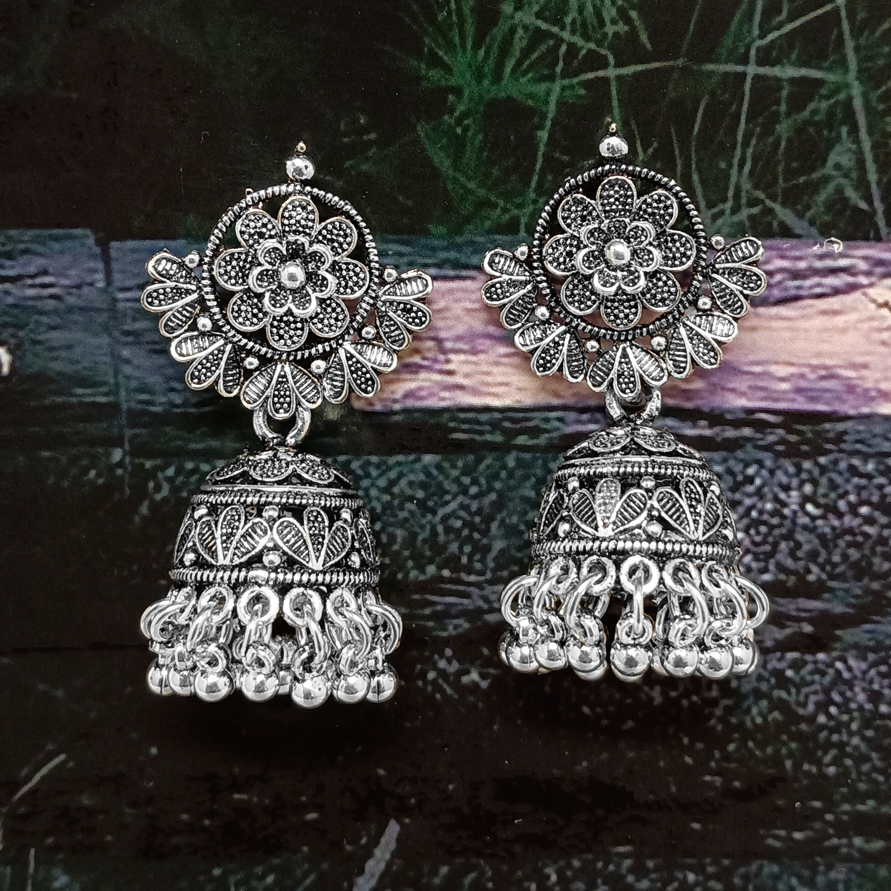 Woma  Jhumkis Earrings