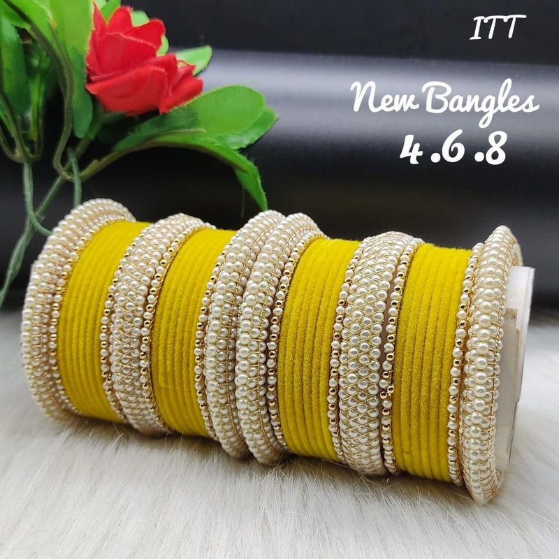 Akruti Collection Gold Plated Velvet and Moti Bangles Set