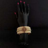 Kriaa Gold Plated Brown Austrian Stone And Pearl Kada