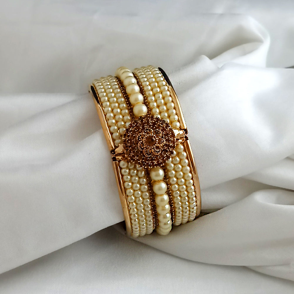 Kriaa Gold Plated Brown Austrian Stone And Pearl Kada