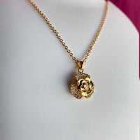 Mahavir Ad Stone Gold Plated Floral Revolving Chain Pendant