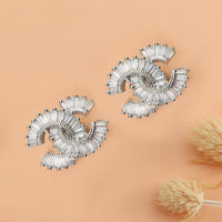 Nipura Interlocked Baguette Allure Stud Earrings