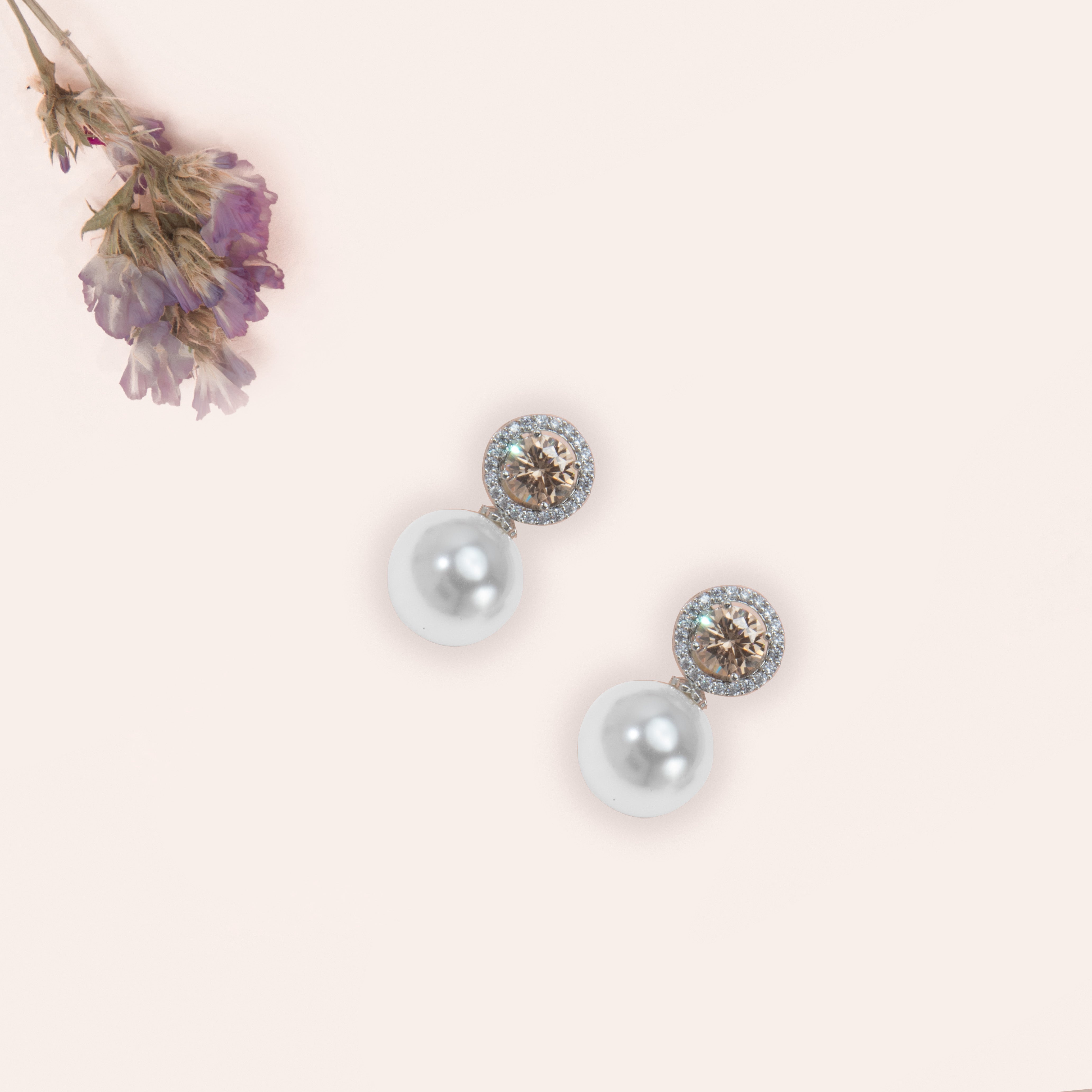 Nipura Peach glistening halo earrings