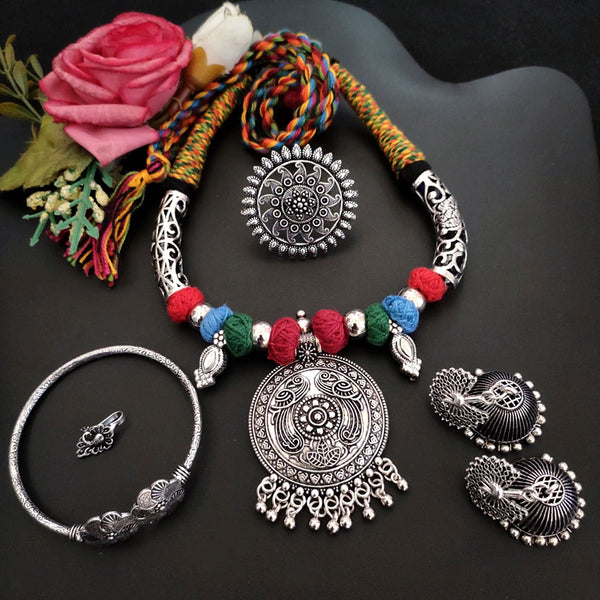 Vaamika Oxidized Plated Necklace Combo Set With Earrings, Finger Ring, Nose pin And Elegant Design Kada