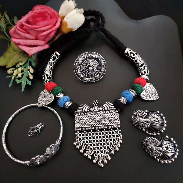 Vaamika Oxidized Plated Necklace Combo Set With Earrings, Finger Ring, Nose pin And Elegant Design Kada