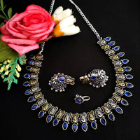 Vaamika Oxidised Plated Dual-Tone Stone Necklace set with Earrings and Nosepin